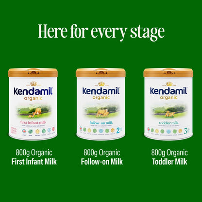 Three cans of Kendamil Organic infant and toddler milk are shown on a solid green background with text reading 'Here for every stage' and labels for First Infant Milk, Follow-on Milk, and Toddler Milk.