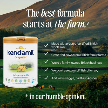 Kendamil organic toddler milk container with a scenic farm background