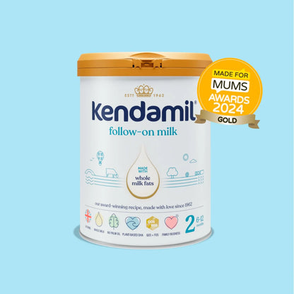 Kendamil follow-on milk container with an award badge on a light blue background