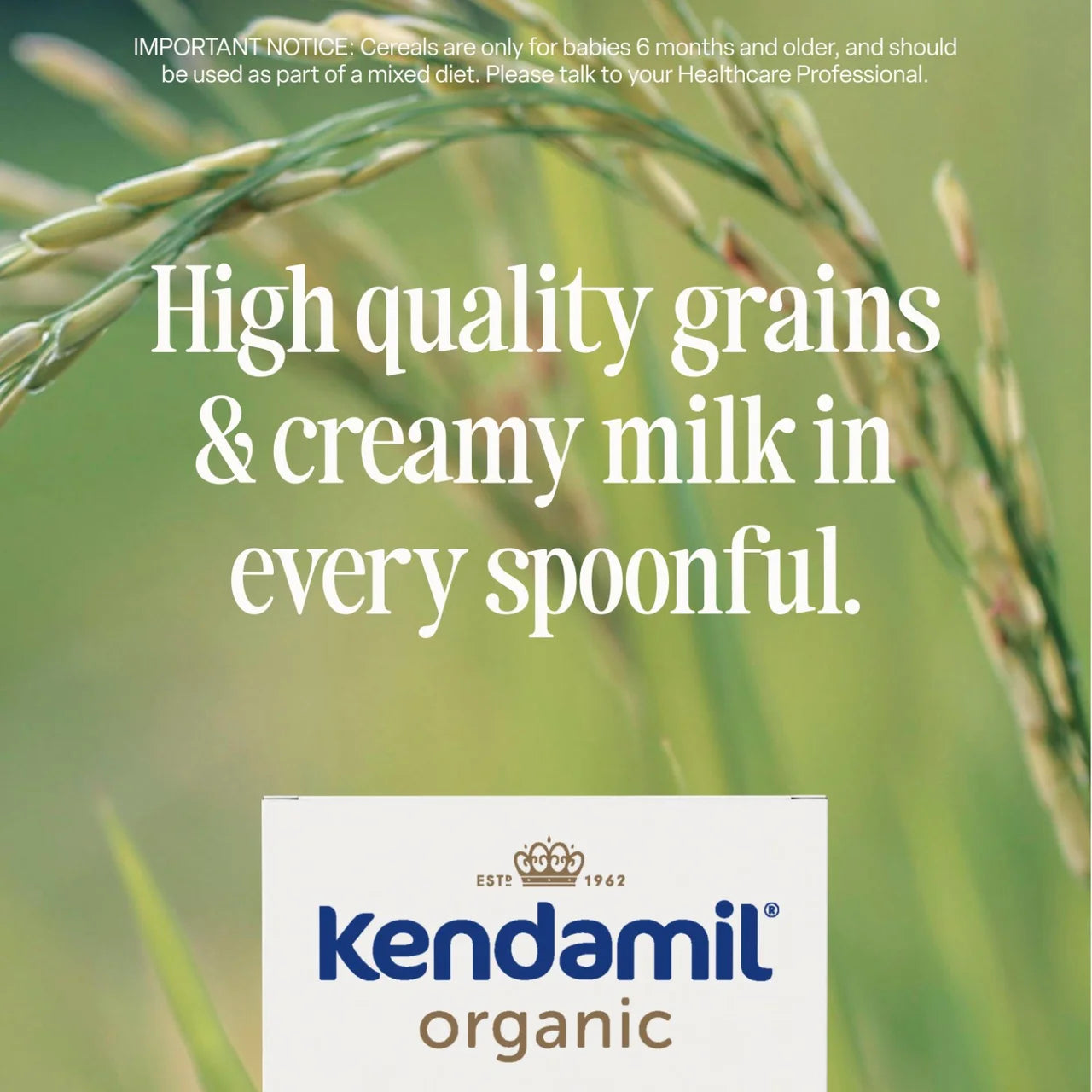 Advertisement for Kendamil organic baby formula with text about high-quality grains and creamy milk, set against a blurred green background.