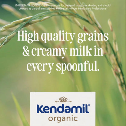Advertisement for Kendamil organic baby formula with text about high-quality grains and creamy milk, set against a blurred green background.