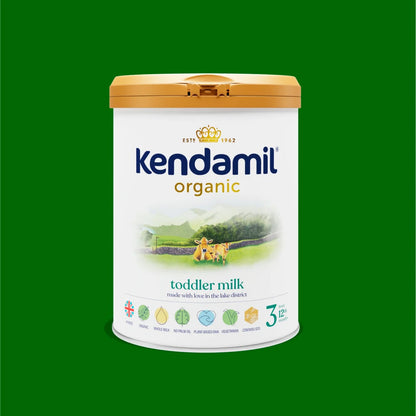 Kendamil organic toddler milk canister on a green background