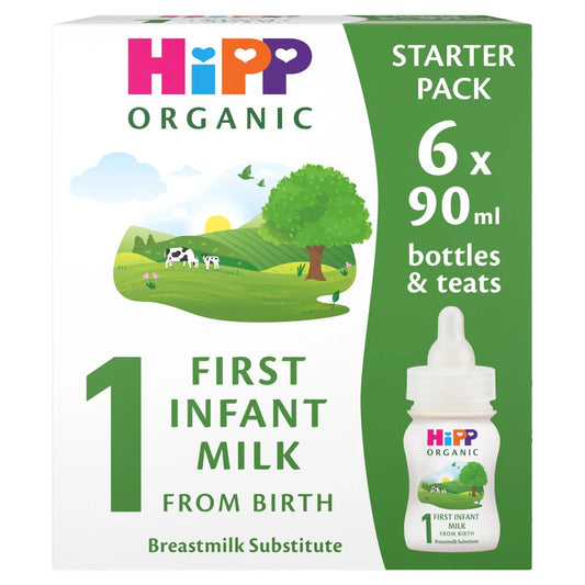 Hipp Organic Starter Pack box for first infant milk from birth, breastmilk substitute. The white and green packaging features a cartoon landscape with cows and a tree, and a small bottle illustration on the right side.