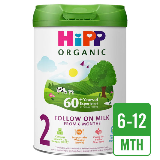 Hipp Organic Follow on Milk container with green lid and colorful branding