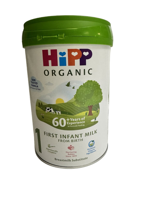 Hipp Organic First Infant Milk container with green lid on a white background