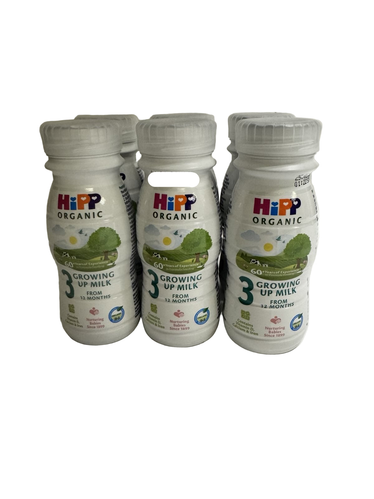 Six bottles of HiPP Organic Growing Up Milk on a white background