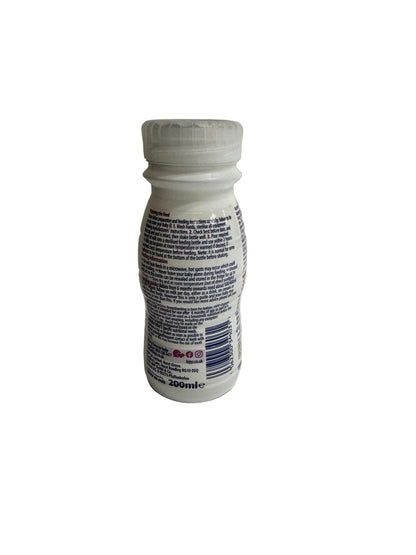 Hipp Organic ready to feed follow on milk Bottle feed preparation label on a plain background